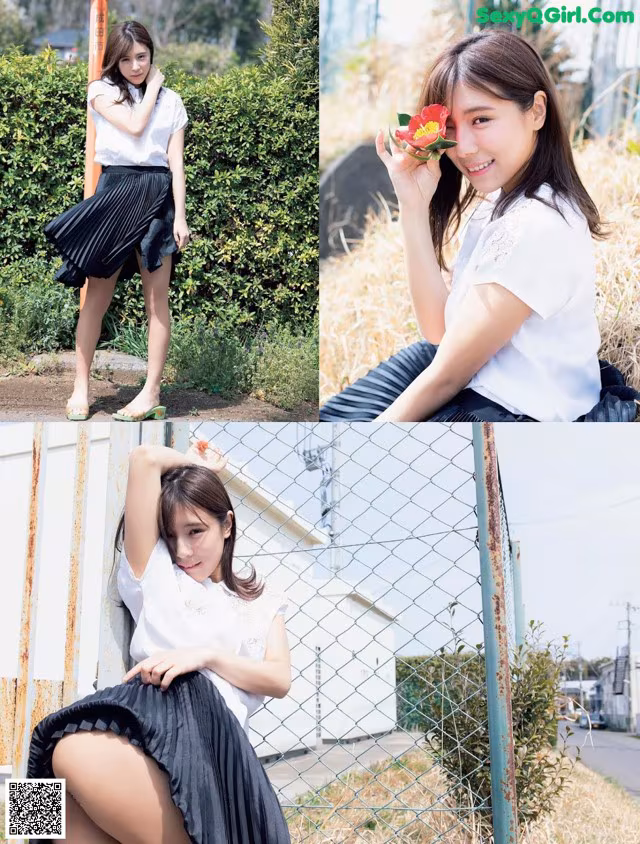 A woman in a white shirt and black skirt posing for a picture.